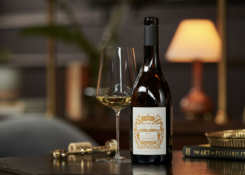 Bottle and glass of La Biblioteca 2019 Chardonnay